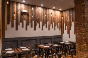 The Urban Tandoor Cozy room equipped with hanging lights and Brooklyn brick décor available for reservations